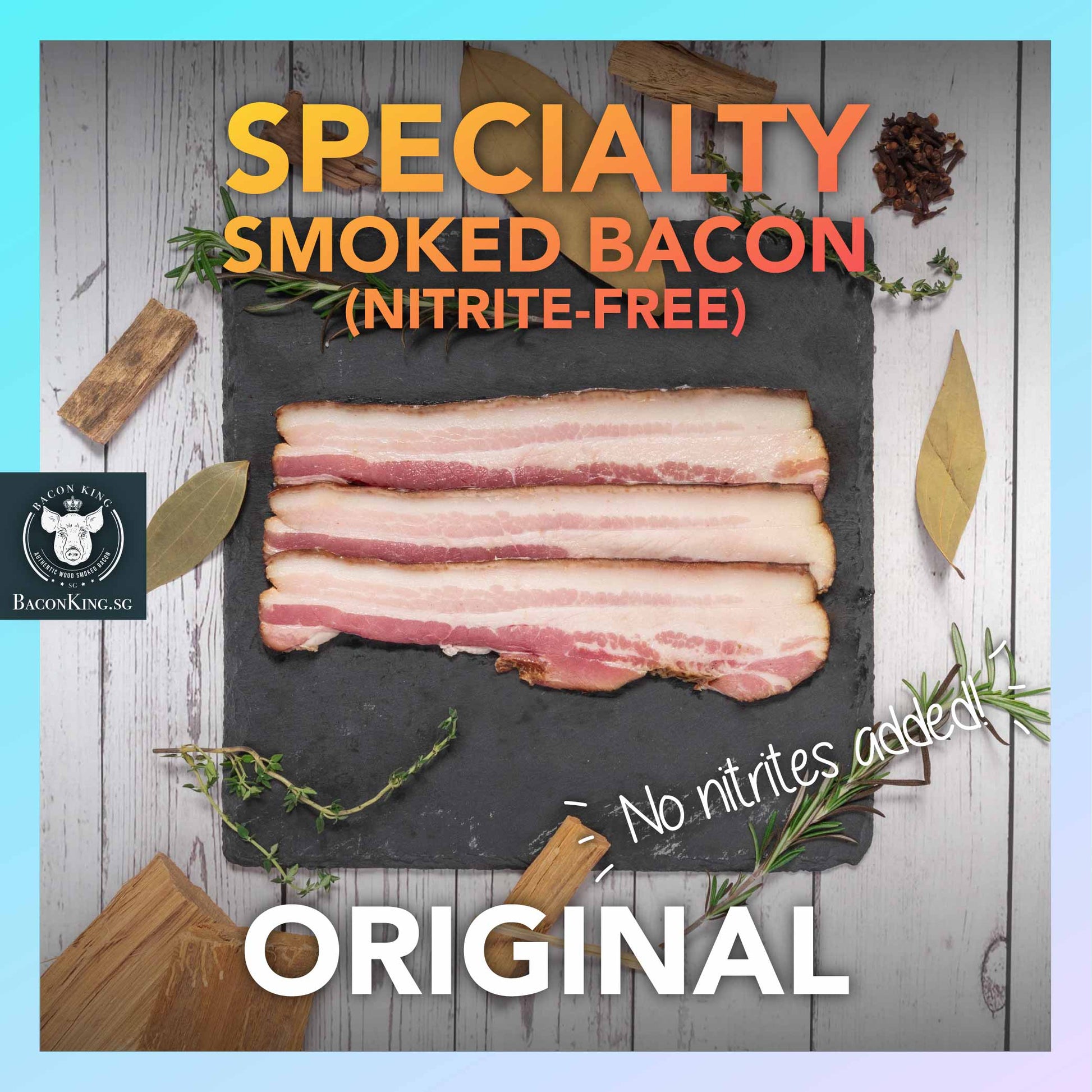 Slices of Original Specialty Smoked Bacon on Stone Plate with Bay Leaves, Rosemary, Thyme, Cloves, Applewood chips decorating the side, against a marble background