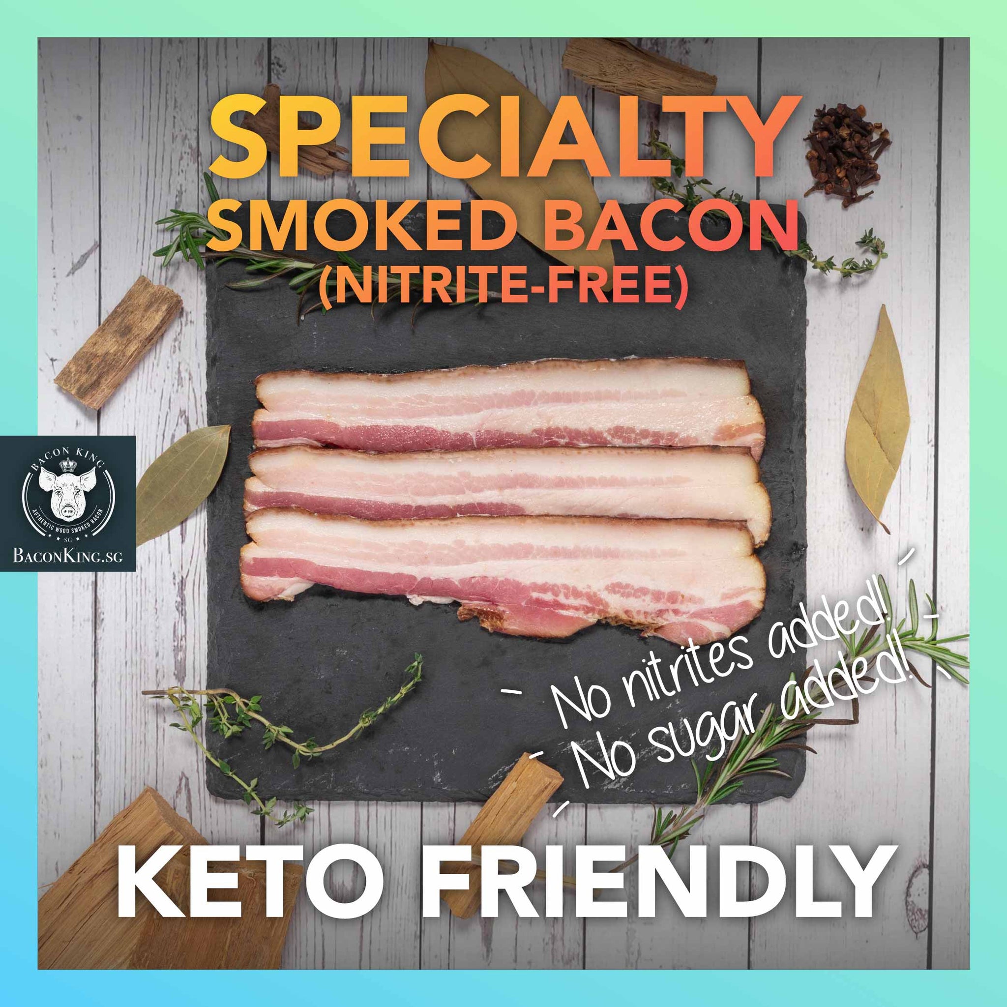Slices of Keto-friendly Specialty Smoked Bacon on Stone Plate with Bay Leaves, Rosemary, Thyme, Cloves, Applewood chips decorating the side, against a marble background