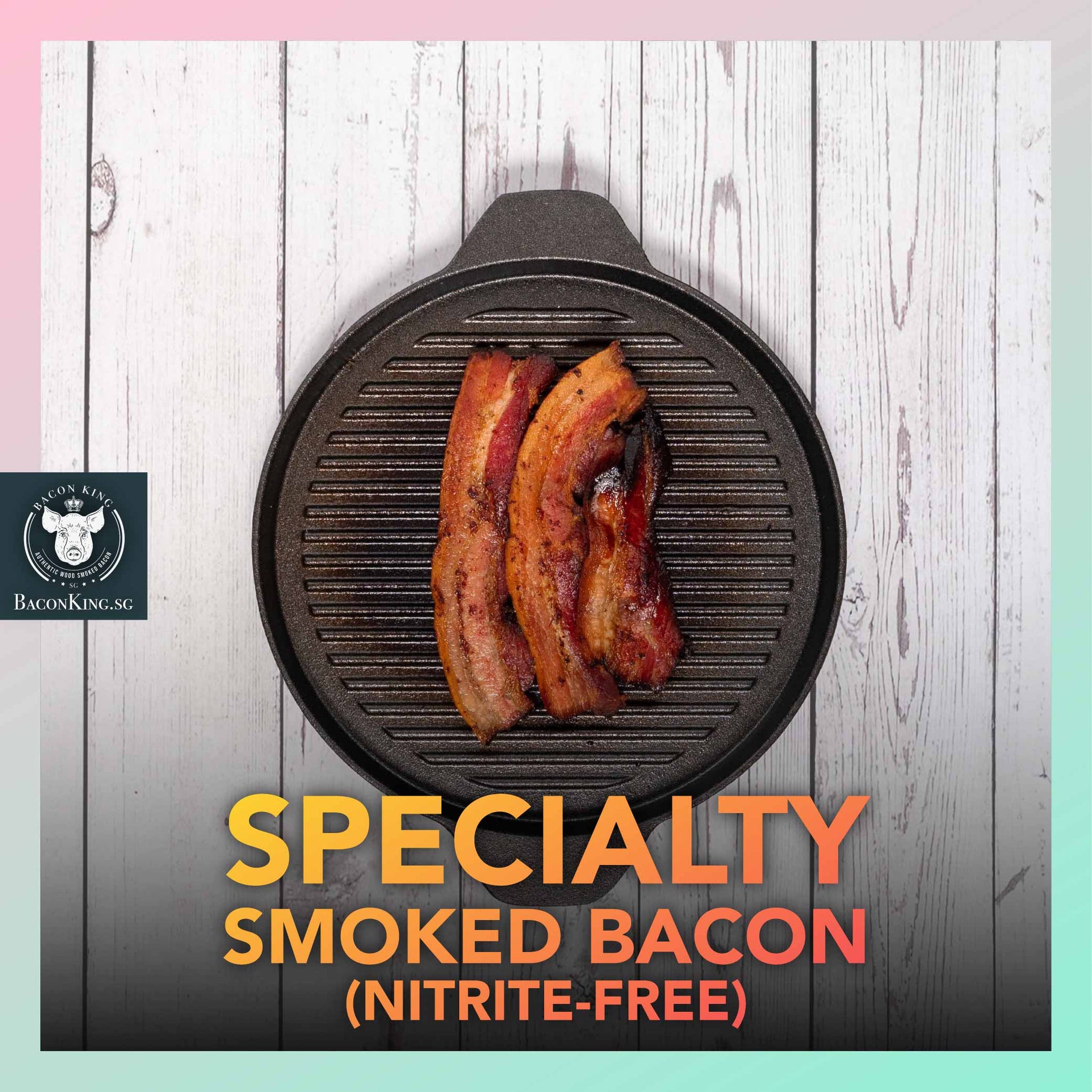 Fried Nitrite-free Smoked Bacon placed on top a stone grill pan, on a wooden background.